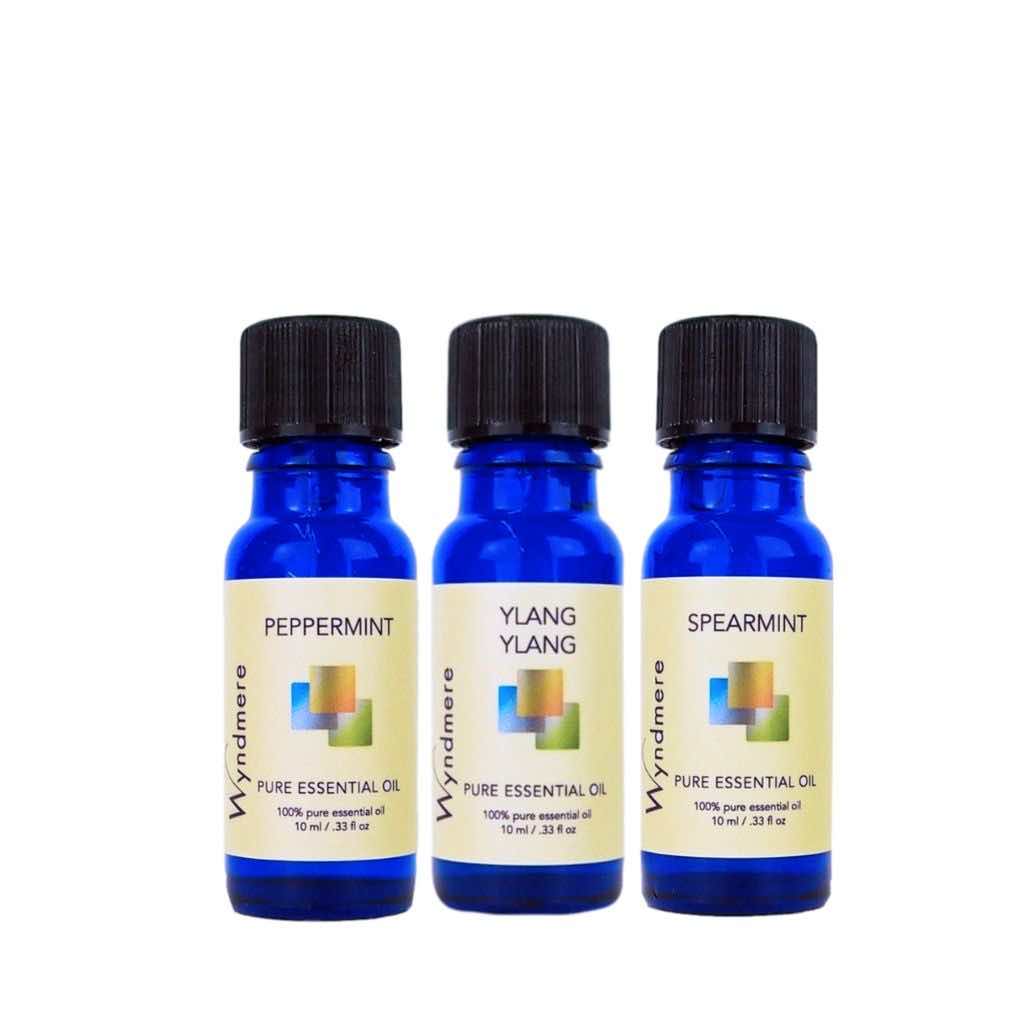 Wyndmere - Uplifting Rise and Shine Recipe Blend. Pictured essential oils peppermint, ylang ylang, spearmint.