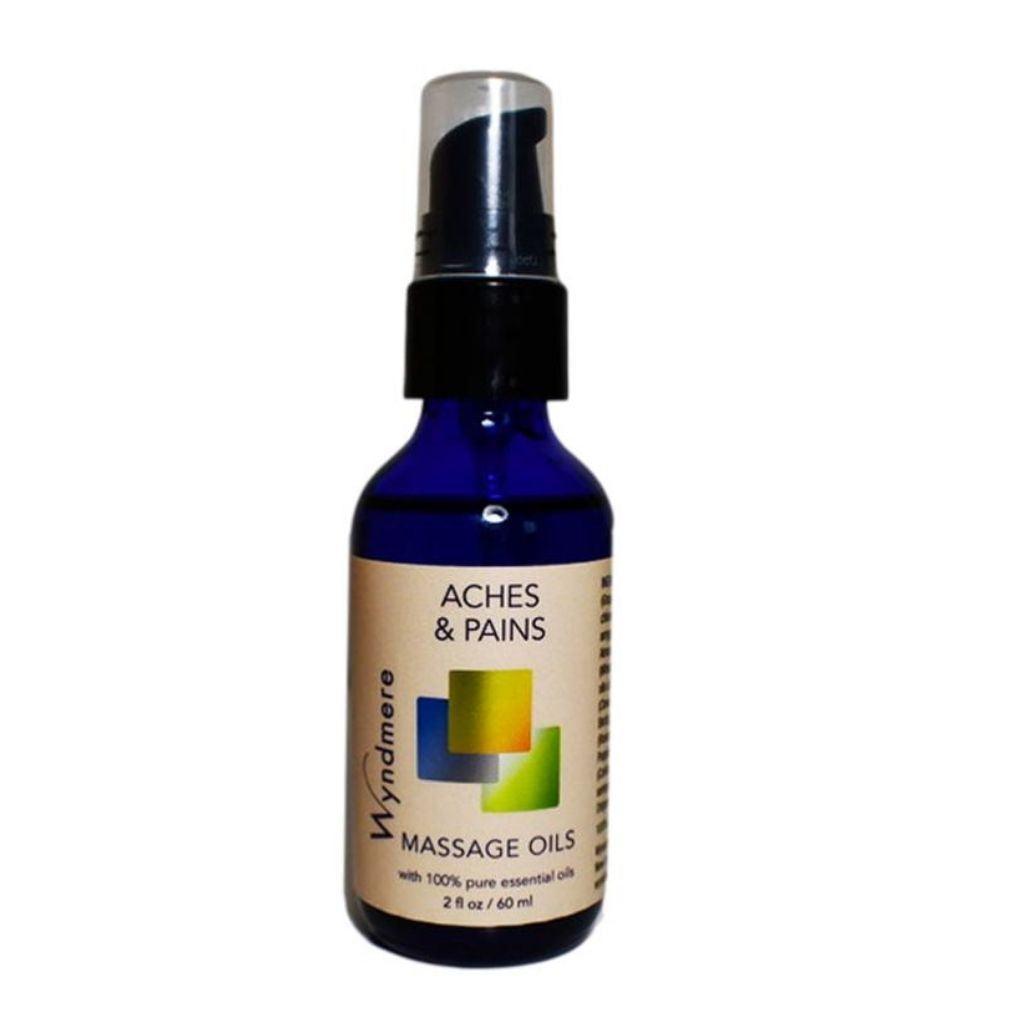 2oz cobalt blue bottle of Aches & Pains Massage Oil