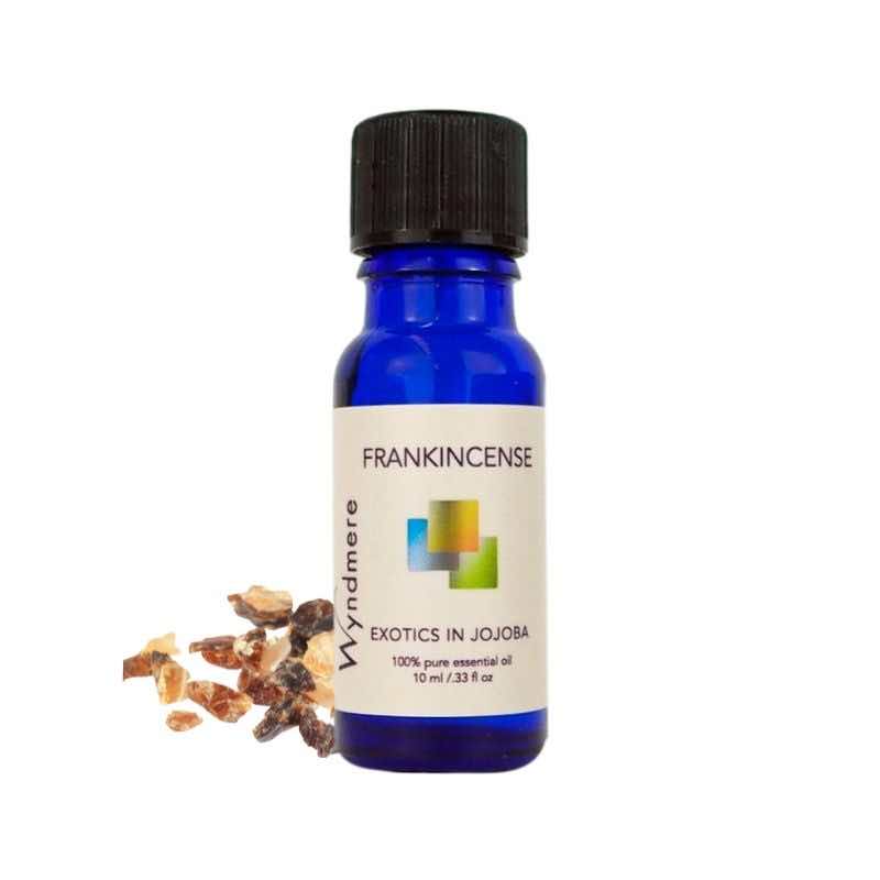 Resin pieces with Wyndmere Frankincense Essential Oil diluted in Jojoba in a 10ml cobalt blue bottle