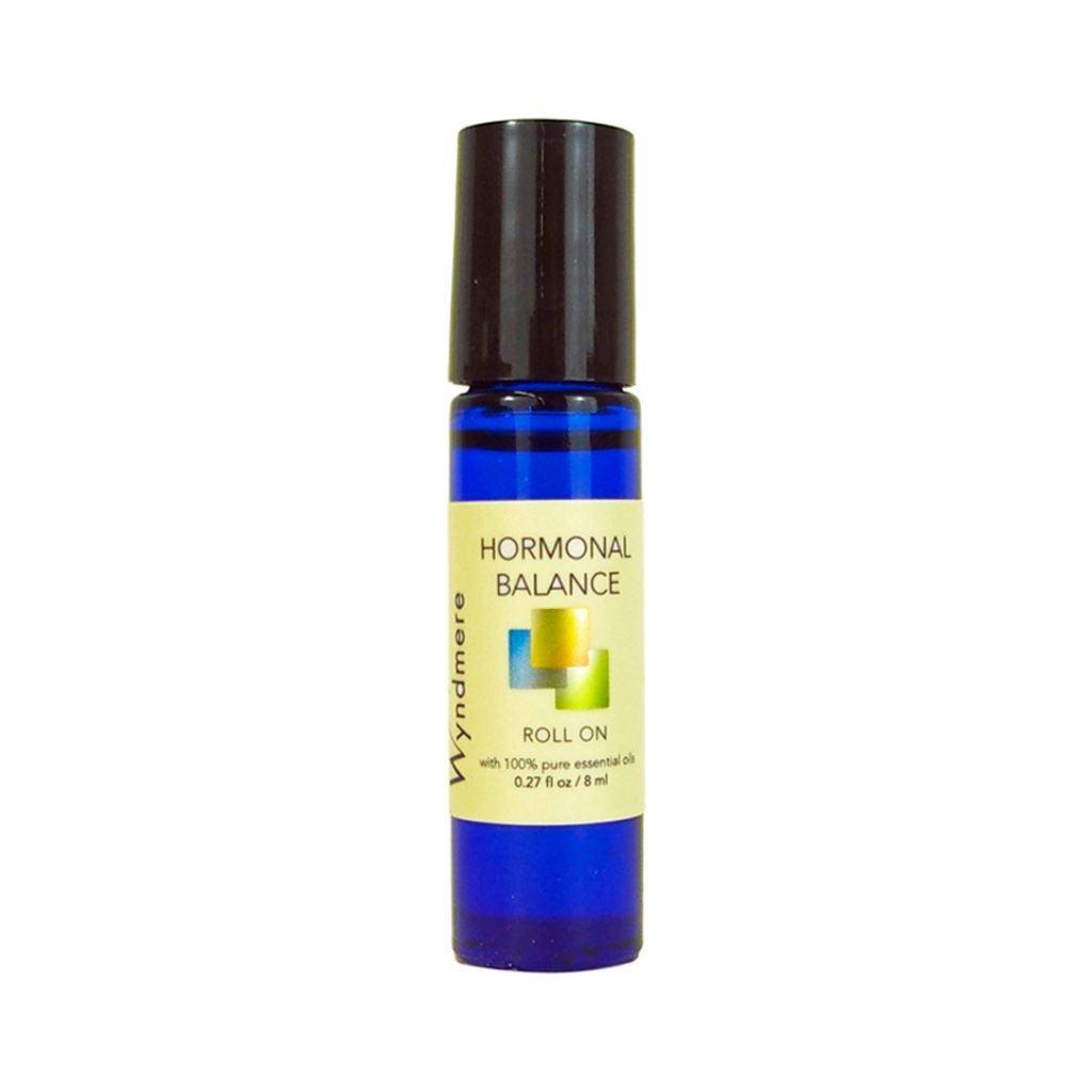 A cobalt blue roll-on bottle of Wyndmere Hormonal Balance
