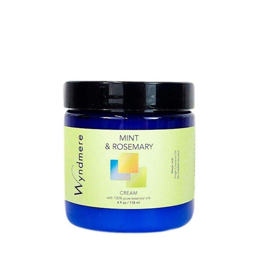 A 4oz cobalt blue jar of Wyndmere Mint & Rosemary cream made with an energizing blend that awakens your senses.