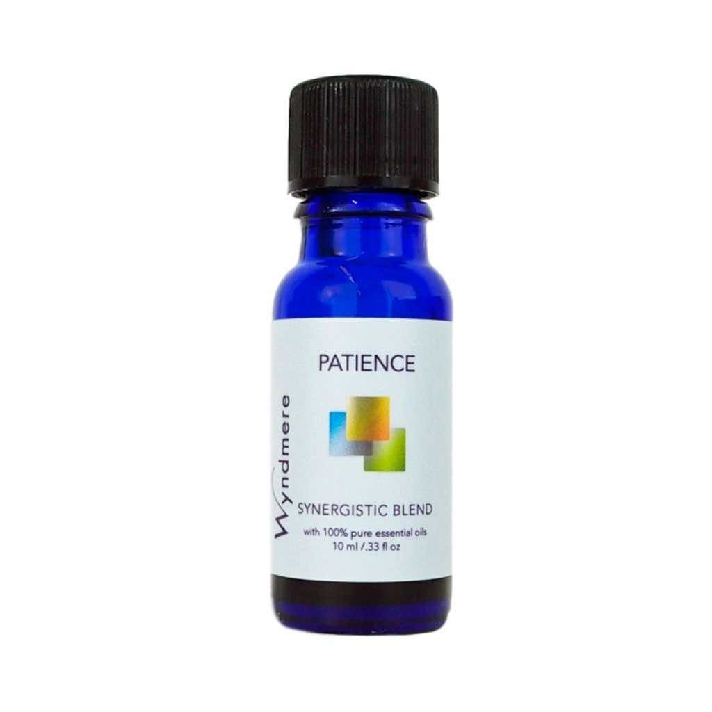 Patience a grounding and calming essential oil blend in a 10ml cobalt blue bottle