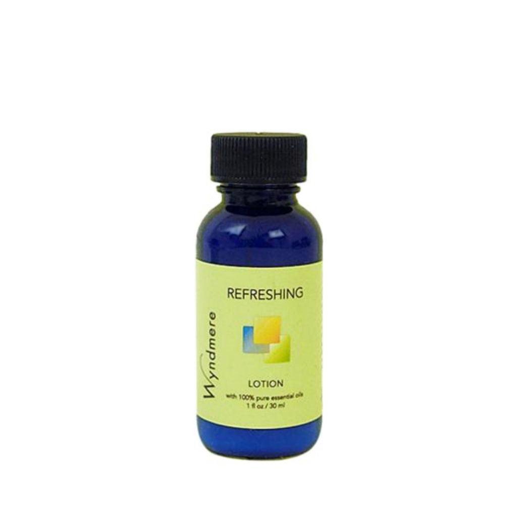 Refreshing Lotion in a 1oz cobalt blue bottle with uplifting and cheerfully fresh essential oils