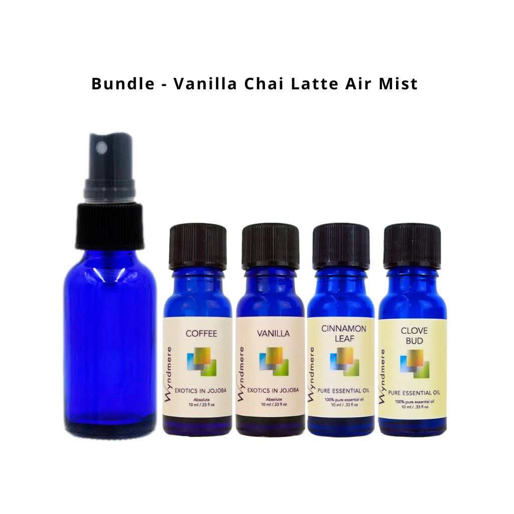 Empty cobalt blue 1oz glass bottle with mister, coffee, vanilla, cinnamon, and clove essential oil