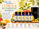 Citrus and Sunshine essential oils bundle with AromaSens diffuser on a wooden surface with citrus fruits in the background.
