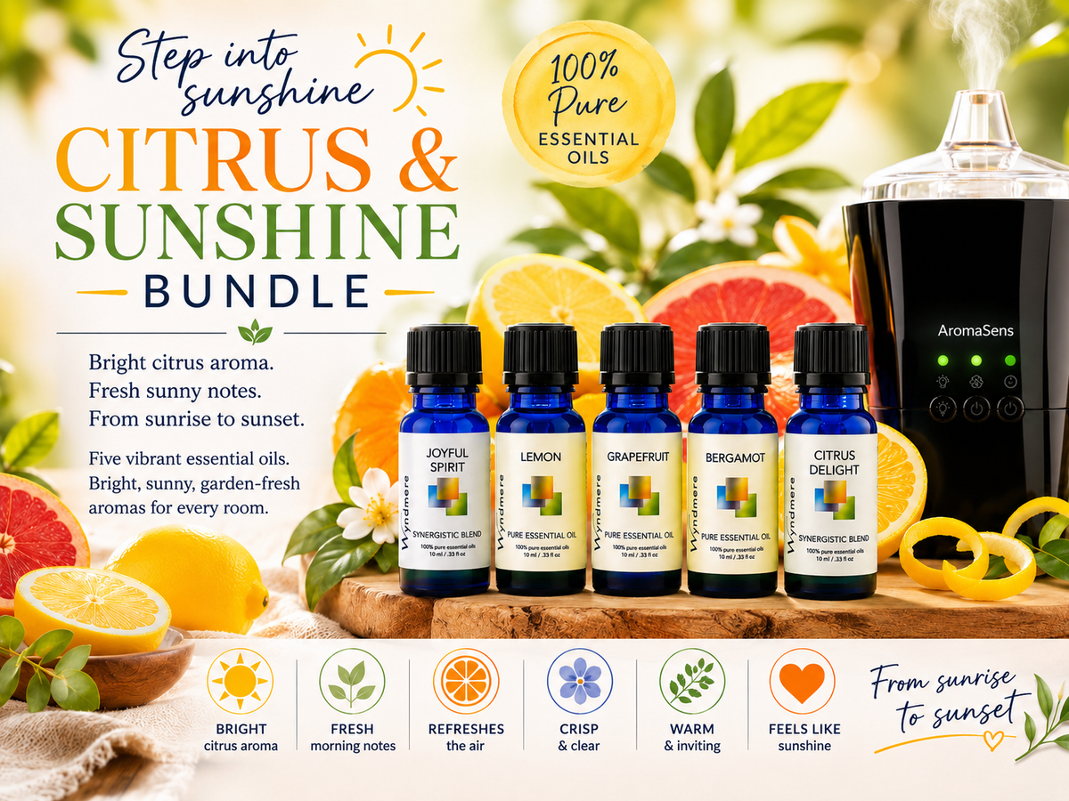 Citrus and Sunshine essential oils bundle with AromaSens diffuser on a wooden surface with citrus fruits in the background.