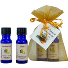 Wyndmere - holiday gifts Frankincense and Myrrh essential oils in jojoba in gold organza bag.