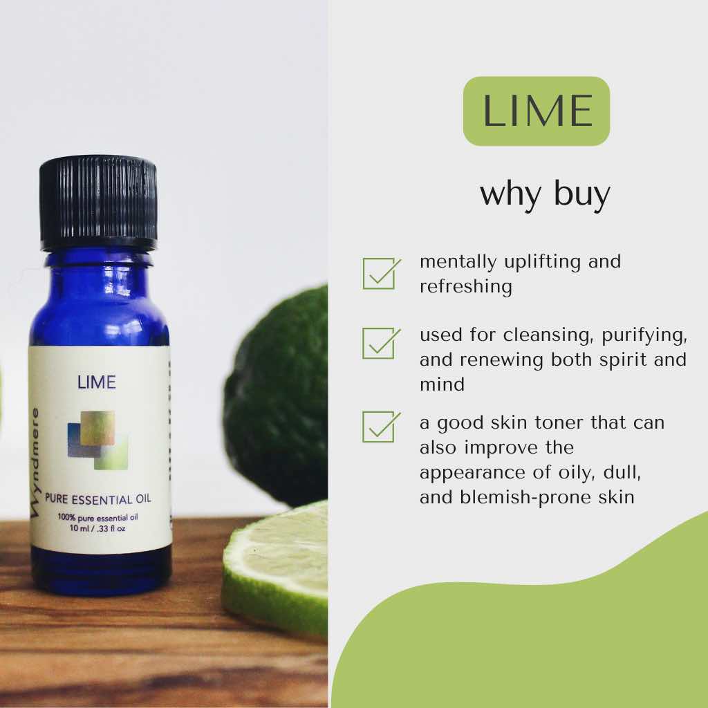 Wyndmere Lime essential oil in a cobalt blue bottle with lime slices on a wooden surface and text about its benefits.