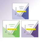 Two square Wyndmere aromatherapy inhalation patches shown side by side on a pale lavender background. The left patch is labeled 'SPEARMINT refresh' with green and white diagonal design elements, and the right patch is labeled 'LAVENDER relax' with purple and white diagonal design elements.