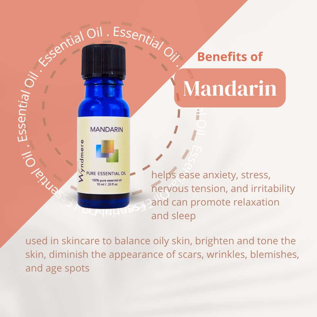 Cobalt blue bottle of Wyndmere Mandarin essential oil with benefits text on a colorful background
