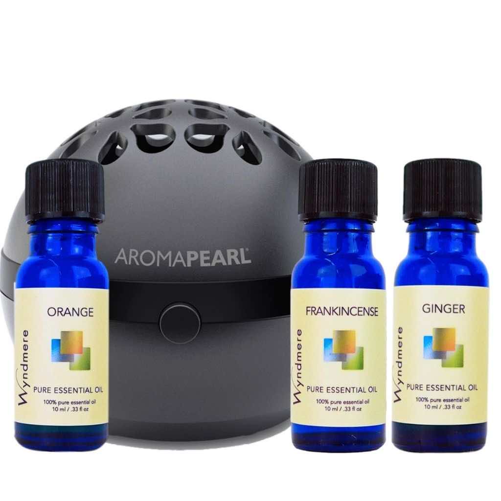 Wyndmere - Scarf Weather Diffuser Blend. Orange, frankincense, and ginger essential oils with a black AromaPearl diffuser.