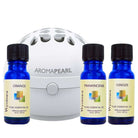  Wyndmere - Scarf Weather Diffuser Blend. Orange, frankincense, and ginger essential oils with a white AromaPearl diffuser.