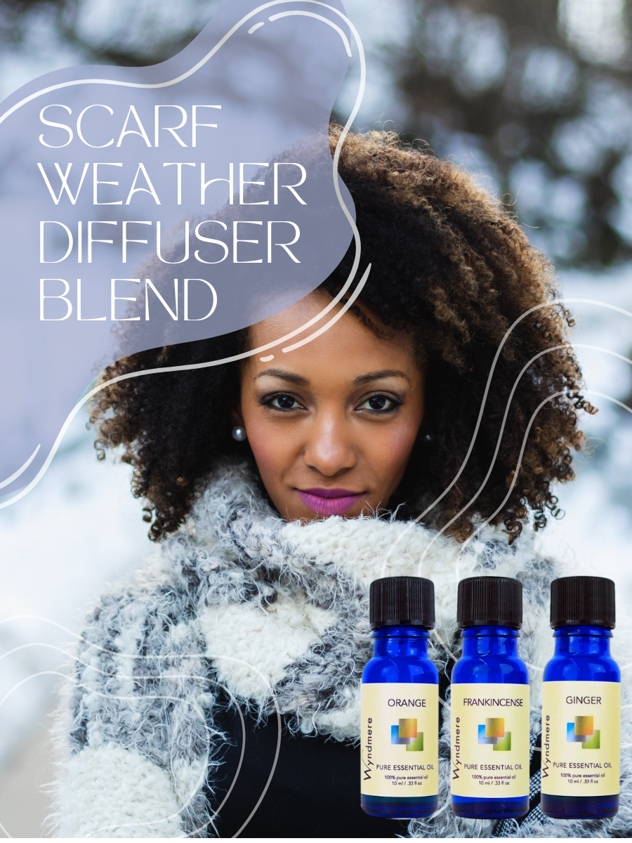 Wyndmere - Woman wearing a scarf in the winter. Scarf Weather feature recipe image of orange, frankincense, and ginger essential oils.