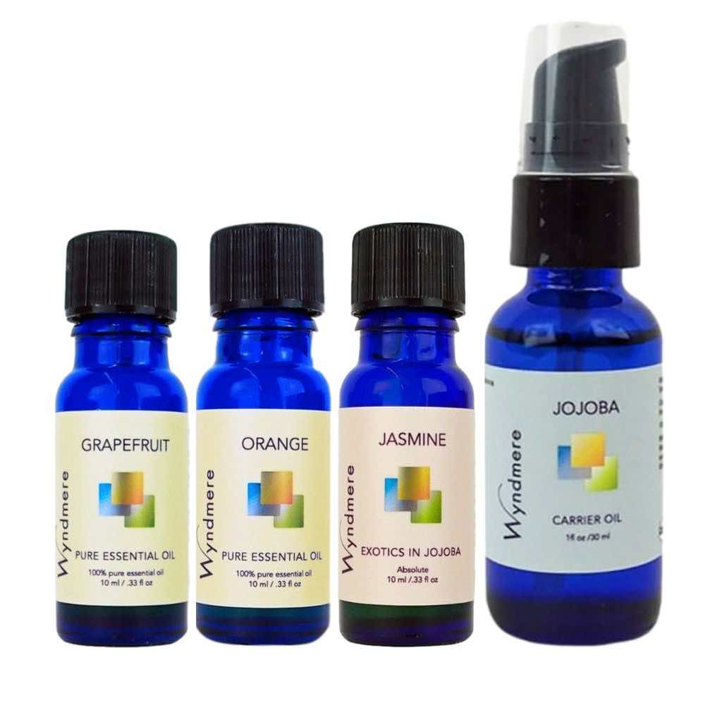 Wyndmere - Uplifting Rise and Shine Recipe Blend. Pictured essential oils spearmint, orange, jasmine, and 1 oz jojoba