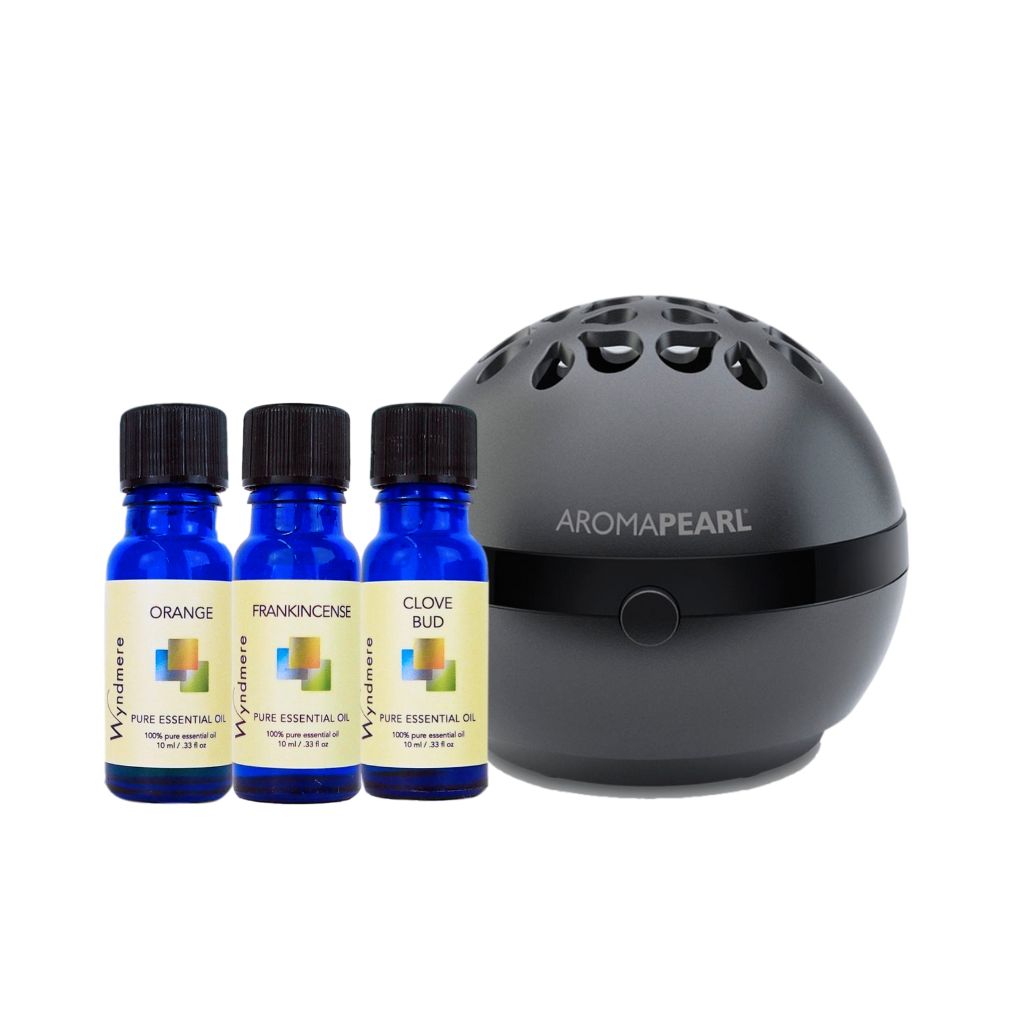 For a DIY diffuser blend, Wyndmere orange, Frankincense, Clove Bud essential oils, and a black AromaPearl.