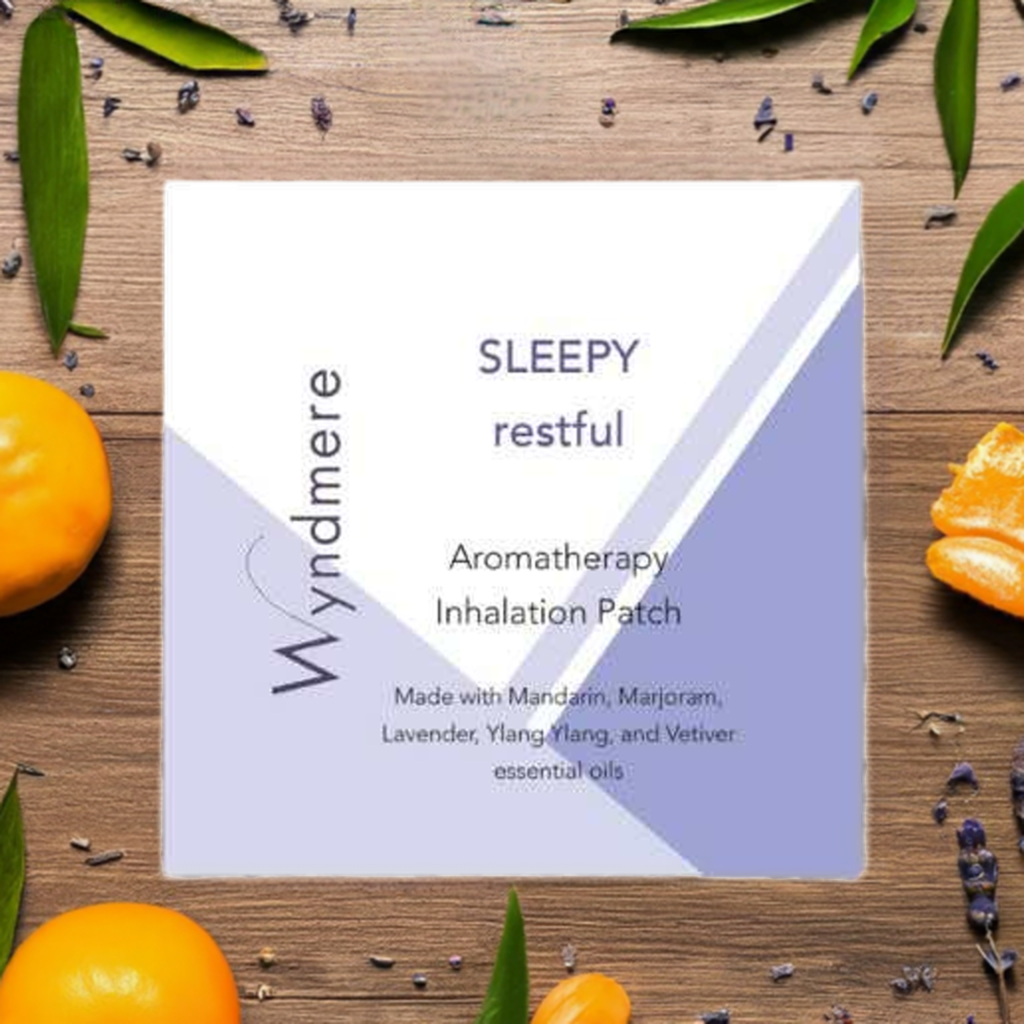 A Sleepy Time patch on a wood background with oranges and lavender 