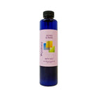6 ounce cobalt blue bottle of Wyndmere Aches & Pains Bath Salt