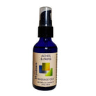 2oz cobalt blue bottle of Aches & Pains Massage Oil