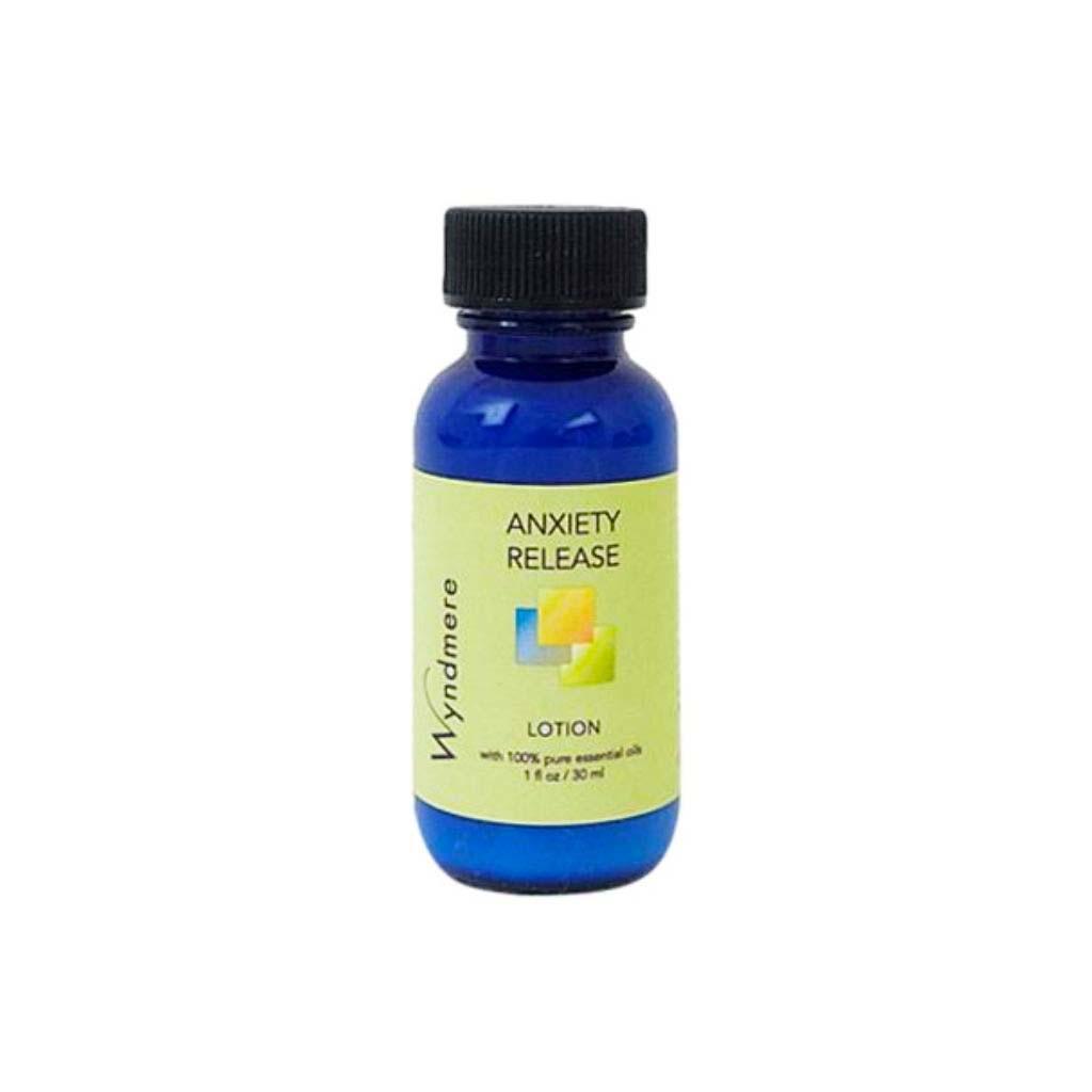 A 1oz cobalt blue bottle of Wyndmere Anxiety Release Lotion