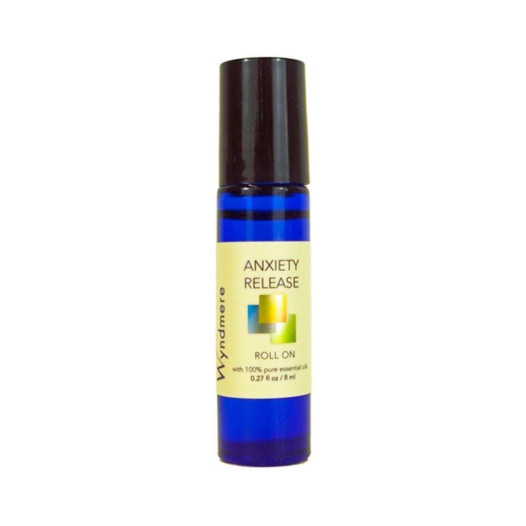 A cobalt blue roll-on bottle of Anxiety Release using the best essential oils for anxiety and nervous tension