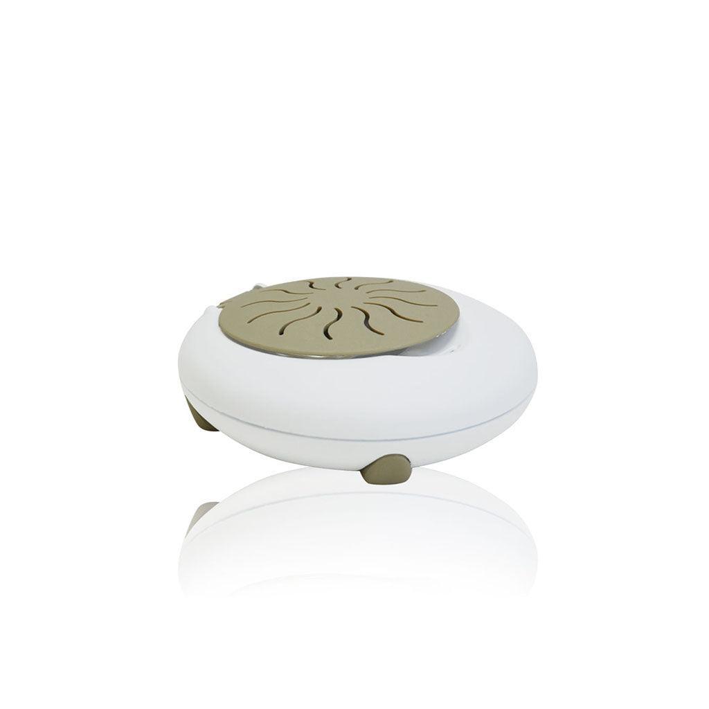 Electric diffuser with white base and tan lid for passive diffusion of essential oils