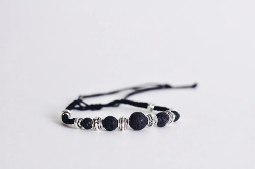 adjustable black corded aromatherapy bracelet with black lava beads