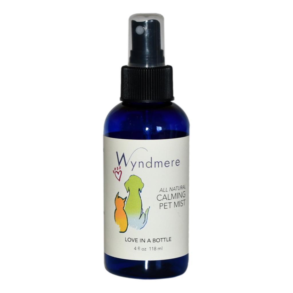 Calming Pet Mist 4 oz in a cobalt blue bottle with mister.