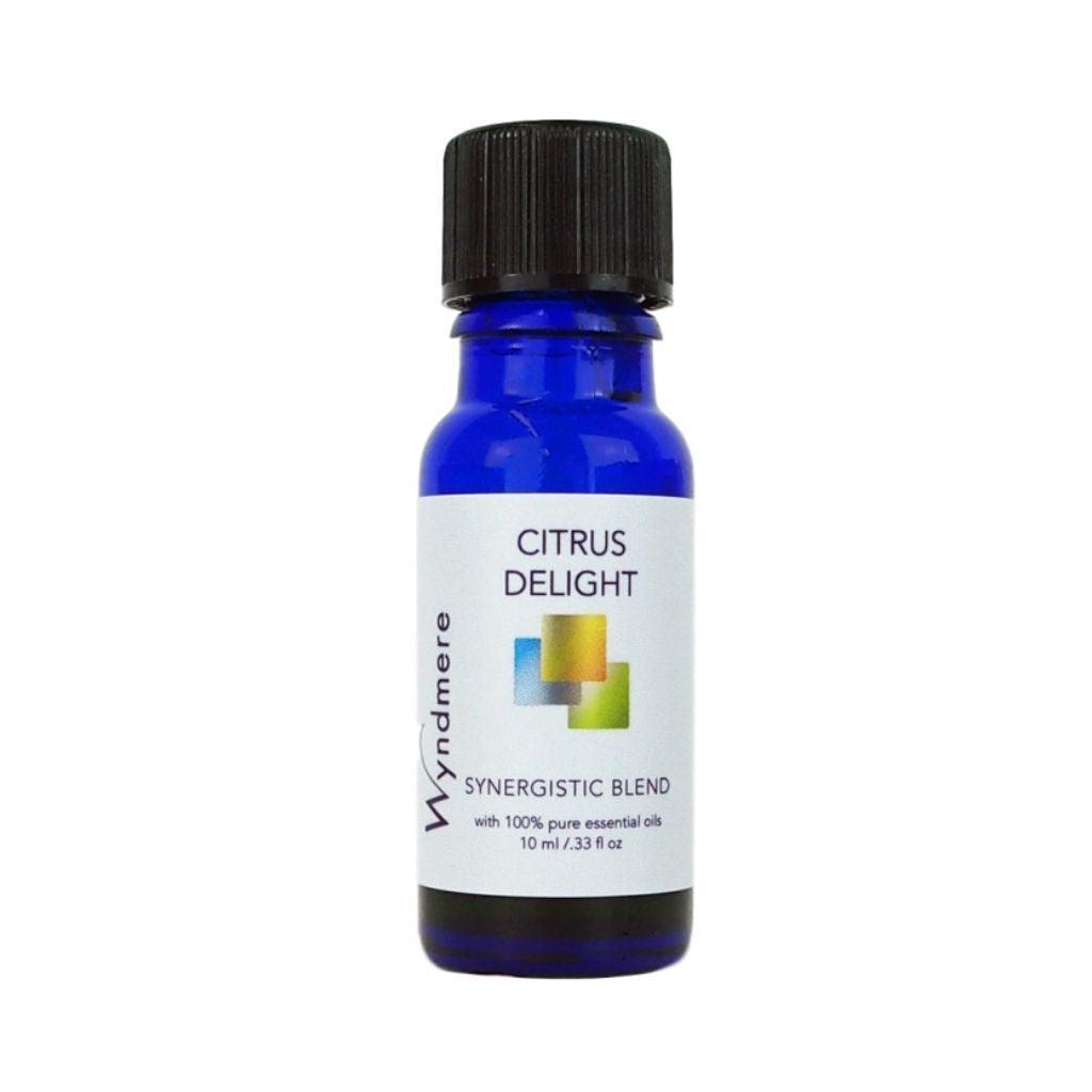 Citrus Delight essential oil blend in a blue bottle - a fusion of uplifting and cheerful essential oils.