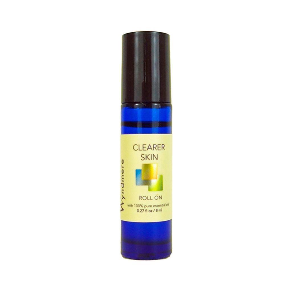 An 8ml cobalt blue roll-on bottle of Clearer Skin blend using the best essential oils for clean complexions
