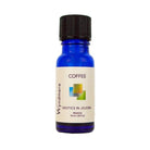 Coffee beans with Coffee Oil diluted in Jojoba in a 10ml cobalt blue bottle