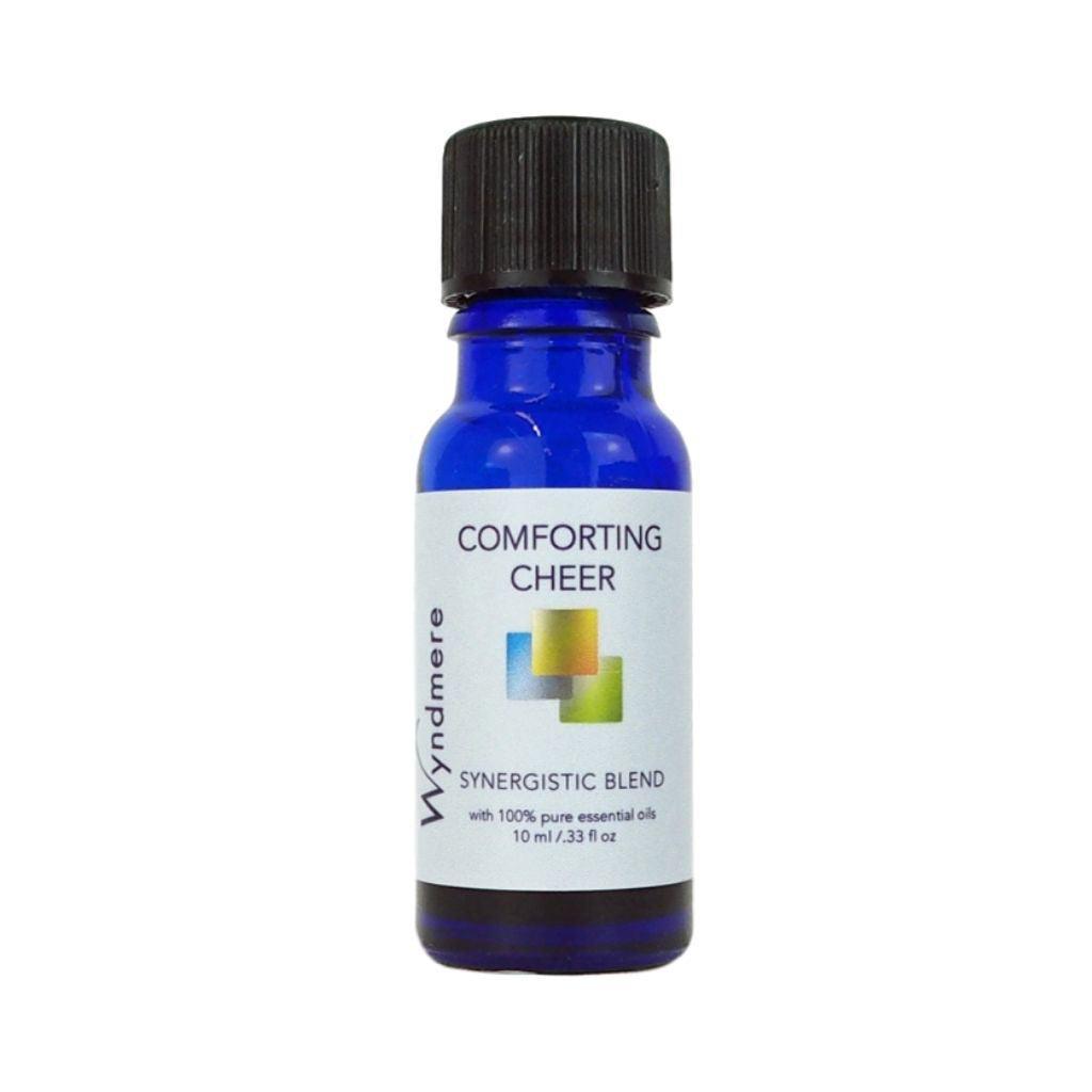 Comforting Cheer essential oil blend in a cobalt blue bottle - a synergy of emotionally warming essential oils.