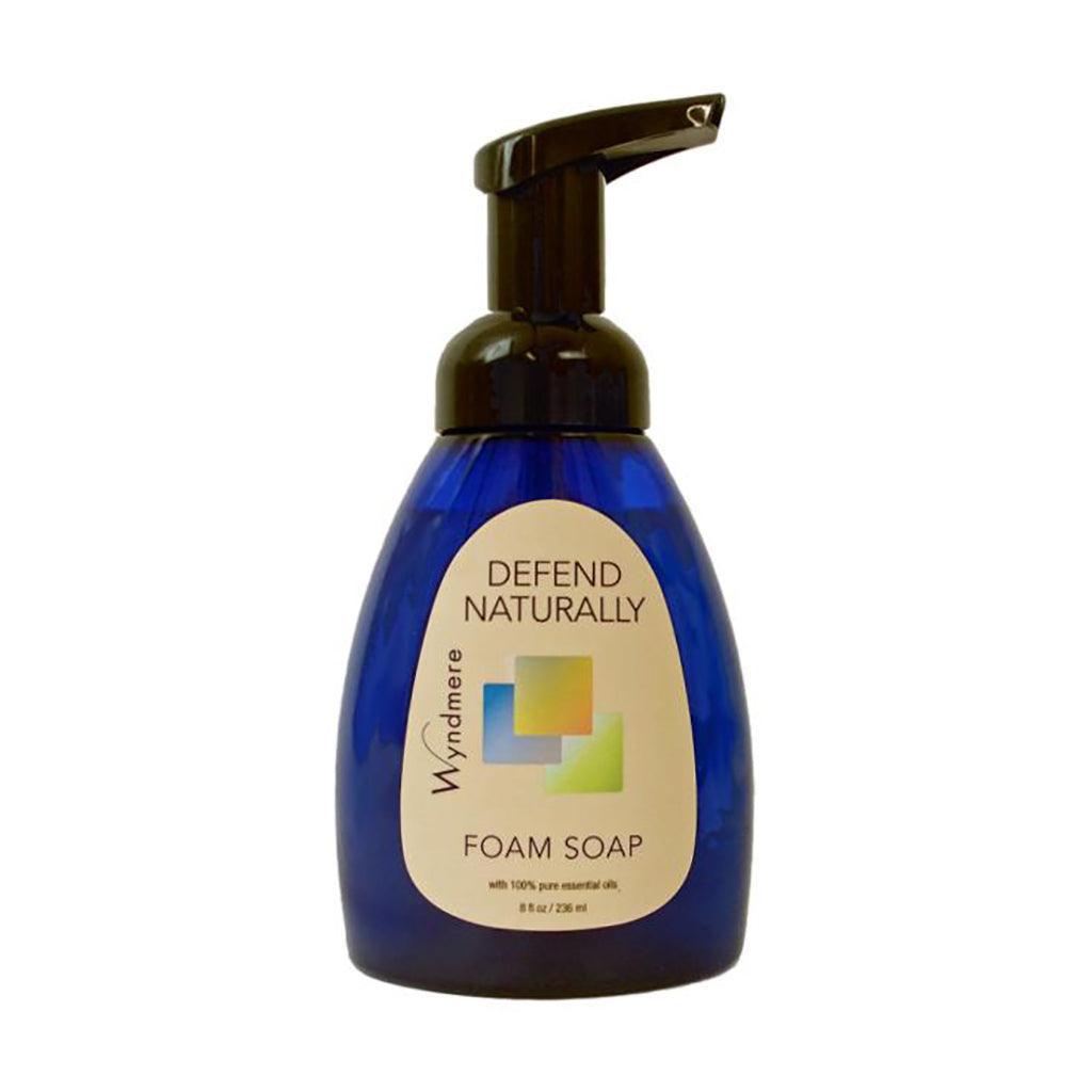 Defend Naturally Foam Soap in a cobalt blue bottle