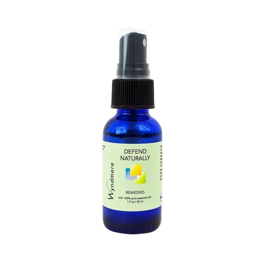 1oz cobalt blue spray bottle of Wyndmere Defend Naturally