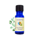 Sprig of Eucalyptus leaves with a 10ml cobalt blue bottle of Wyndmere Eucalyptus globulus Essential Oil