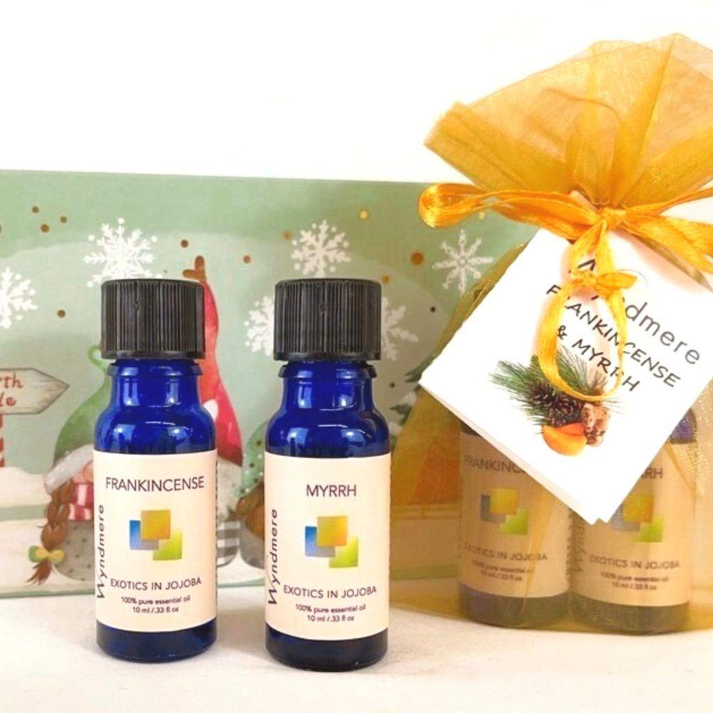 Wyndmere - holiday gifts Frankincense and Myrrh essential oils in jojoba in gold organza bag.