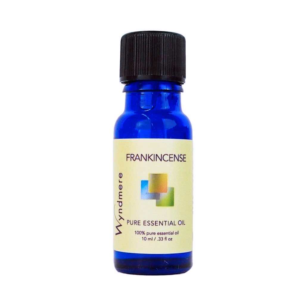 Frankincense - 10ml cobalt blue bottle of Wyndmere Frankincense Essential Oil with an earthy, spicy scent.