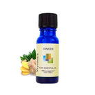 Slices of fresh ginger root with a 10ml cobalt blue bottle of Wyndmere Ginger Essential Oil
