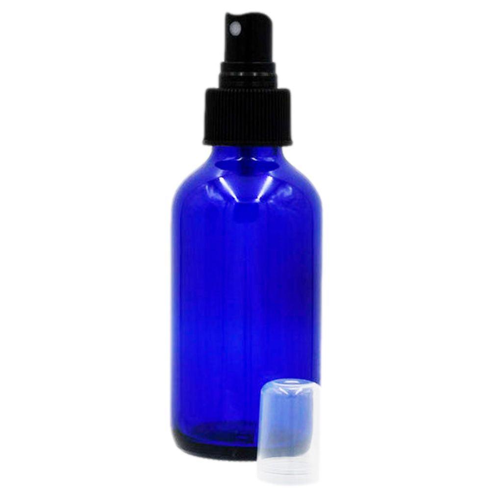 4 oz cobalt blue boston round glass bottle with black fine spray mister with clear hood