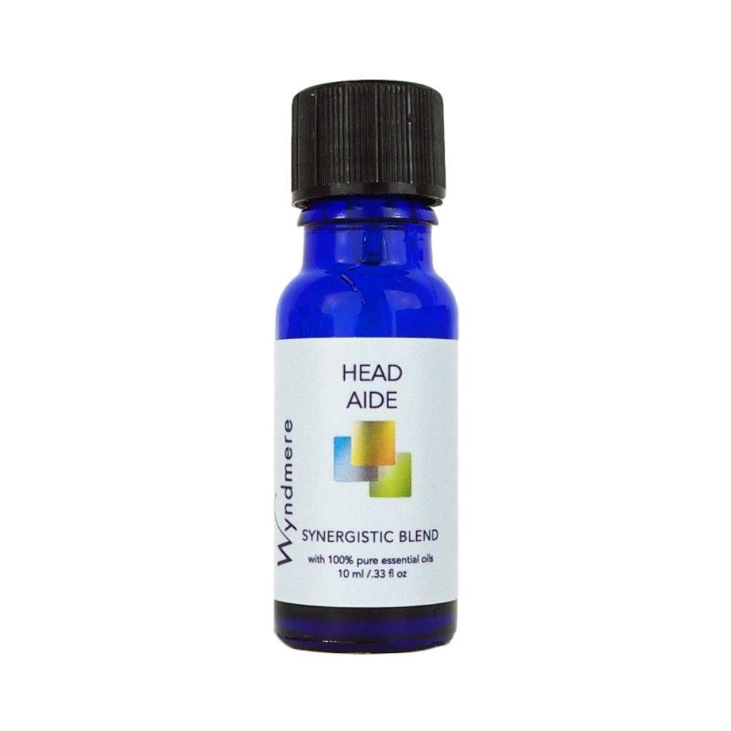 Wyndmere Head Aide essential oil blend in a 10ml cobalt blue bottle