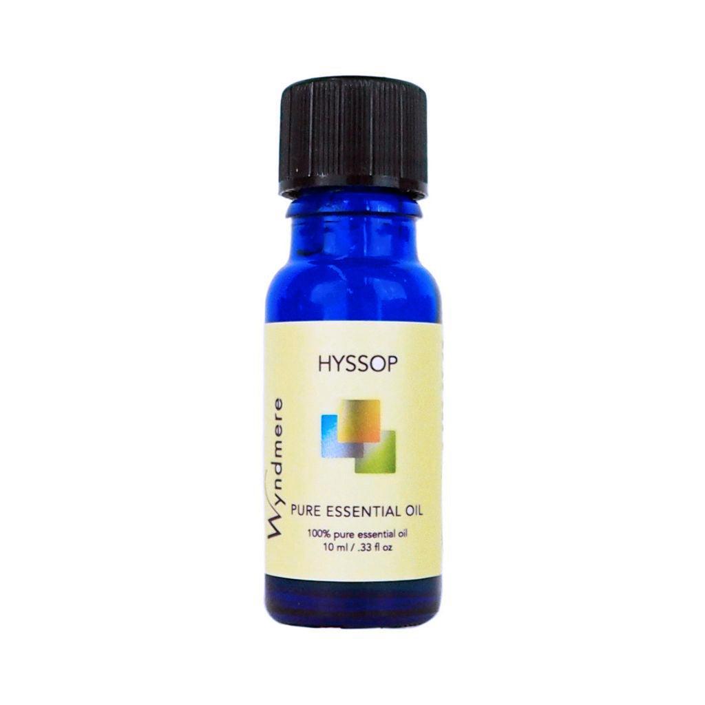 Hyssop - Blue bottle of Wyndmere Hyssop Essential Oil with a sweet top note and spicy undertone. Helps tone skin.