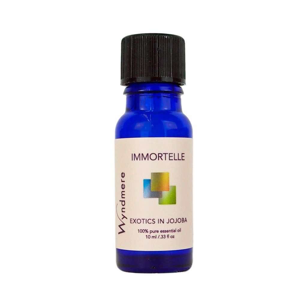 Immortelle - Blue bottle of Wyndmere Immortelle Essential Oil diluted in Jojoba. Also known as Everlasting or Helichrysum