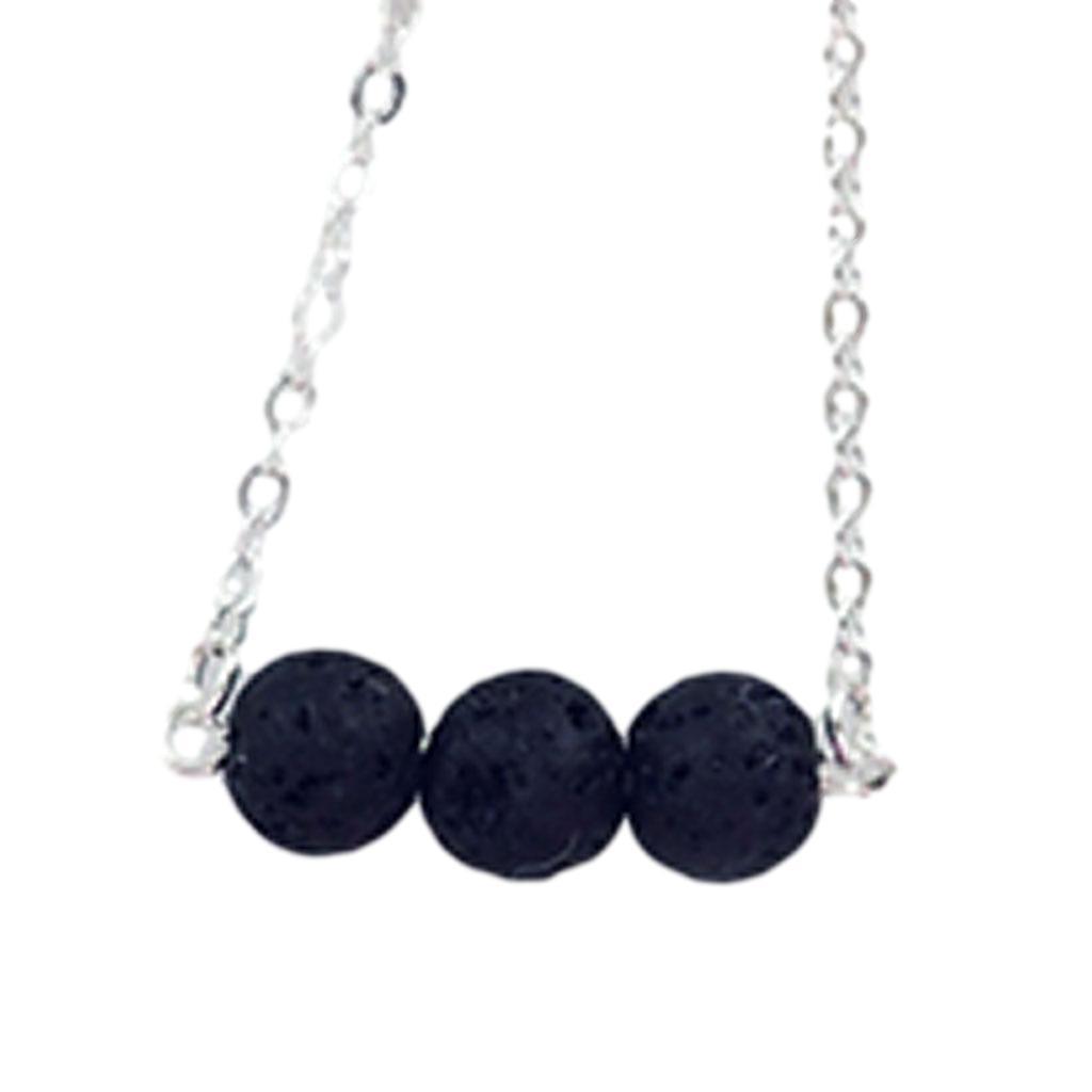 aromatherapy necklace of 3 black lava beads on a silver chain