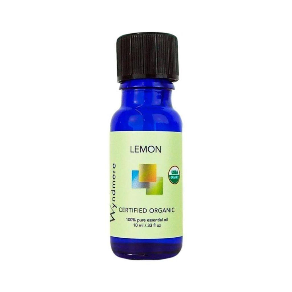 Lemon - 10ml cobalt blue bottle of Wyndmere Certified Organic Lemon Essential Oil that has a citrus, uplifting aroma
