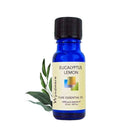 Eucalyptus citriodora leaves with a 10ml cobalt blue bottle of Wyndmere Lemon Eucalyptus (citriodora) Essential Oil