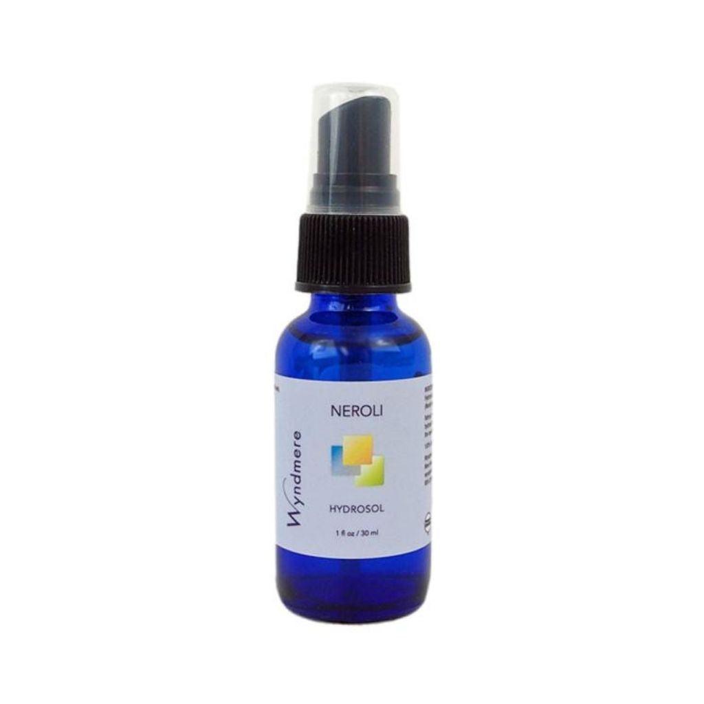 1oz cobalt blue bottle of Neroli floral water, a true hydrosol. Also known as Orange Blossom.