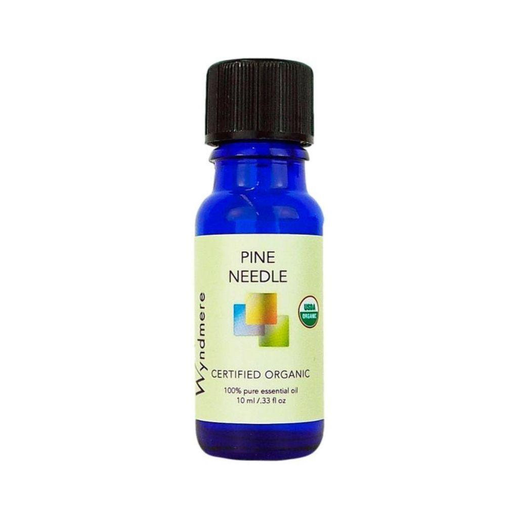 Pine Needle - 10ml cobalt blue bottle of Wyndmere Certified Organic Pine Needle Essential Oil that has a woody, clean forest aroma