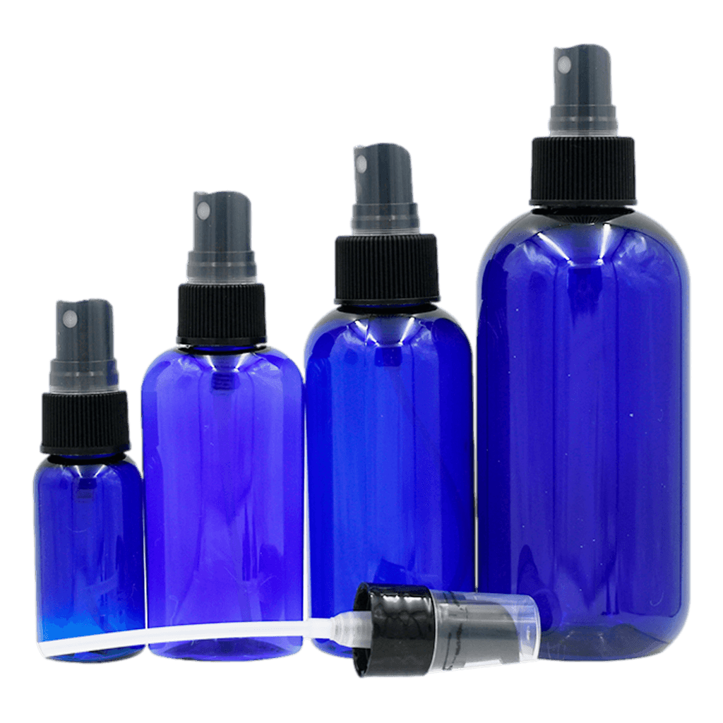 Grouping of plastic (PET) bottles of various sizes, shapes - with black fine mist sprayer and clear domed hood