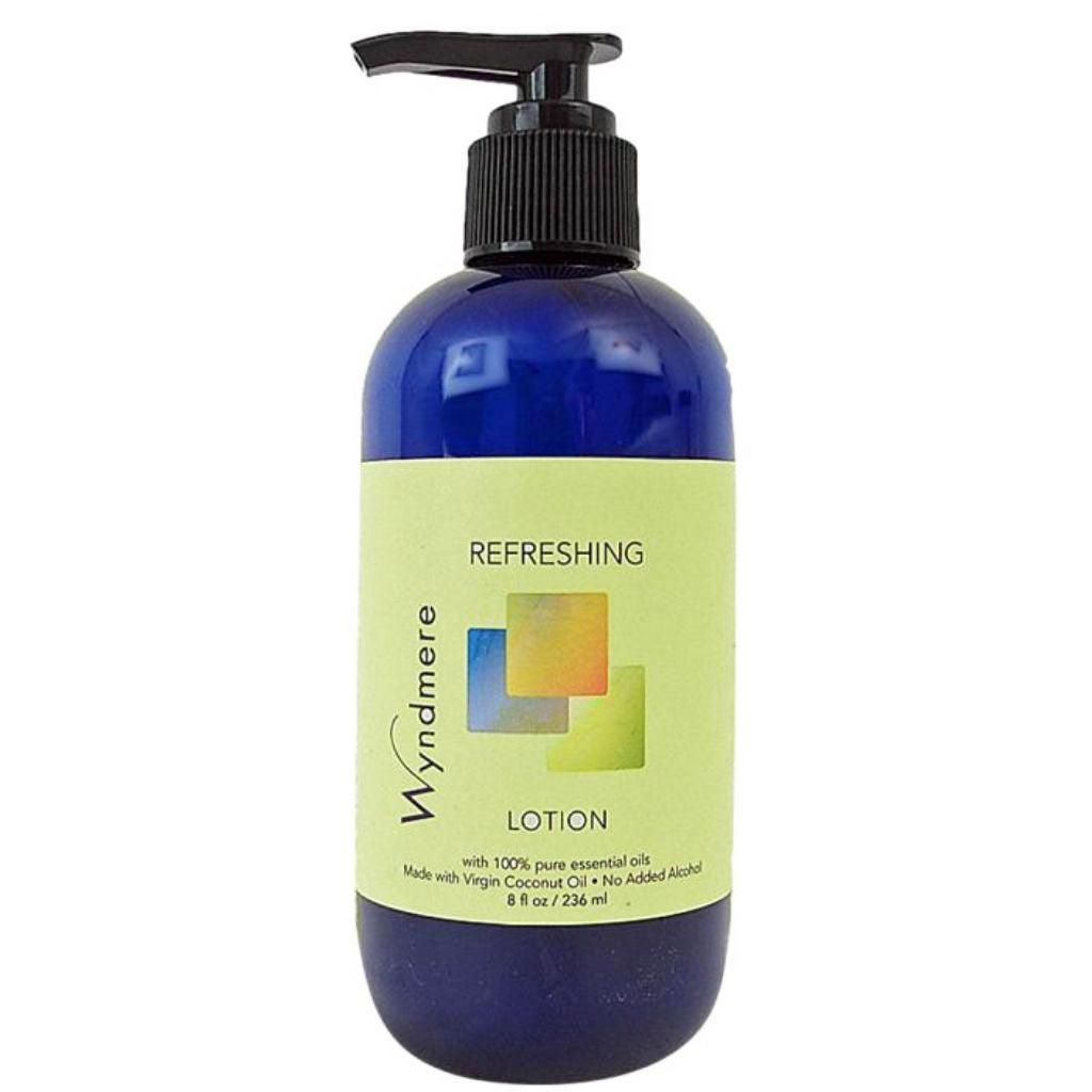 Refreshing Lotion in a 8oz cobalt blue bottle with uplifting and cheerfully fresh essential oils