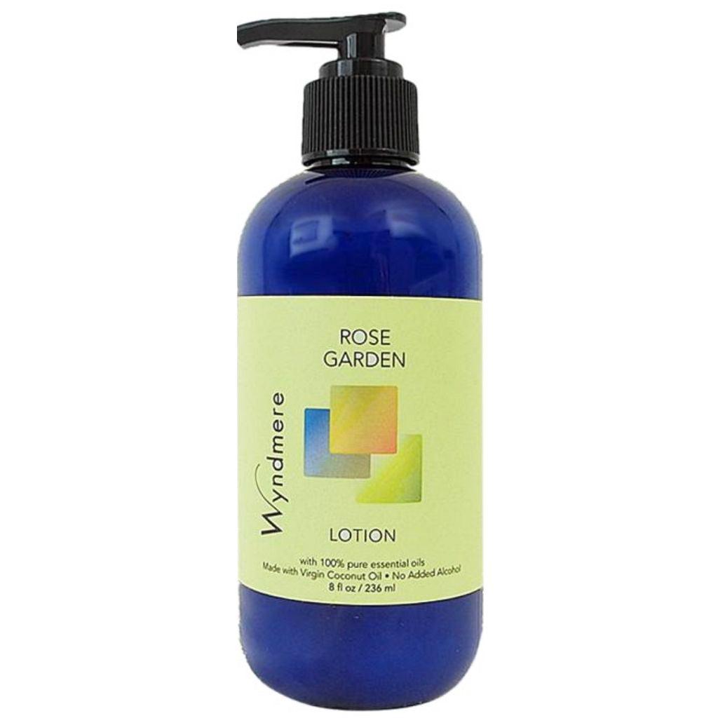 An 8oz cobalt blue bottle of Rose Garden moisturizing lotion that smells exquisitely