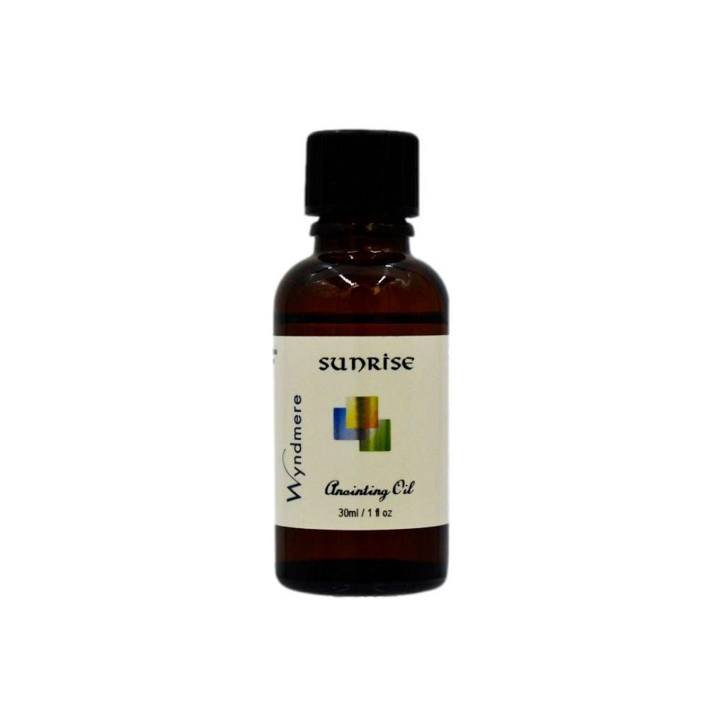 1oz amber bottle of Sunrise Anointing Oil, Wyndmere Sunrise energizing blend of essential oils diluted in jojoba